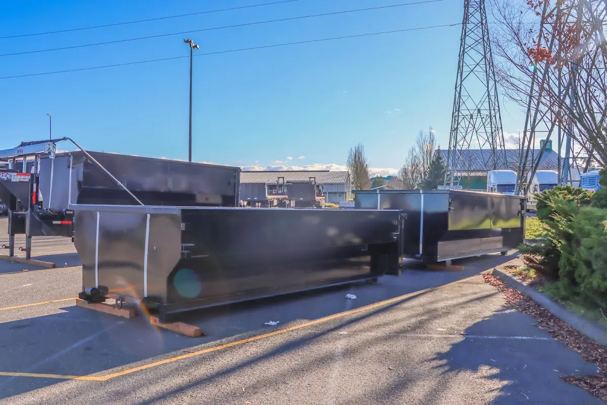 Roll-off dumpster ready for waste disposal at job site for Demolition Dumpster Rental in Murphy
